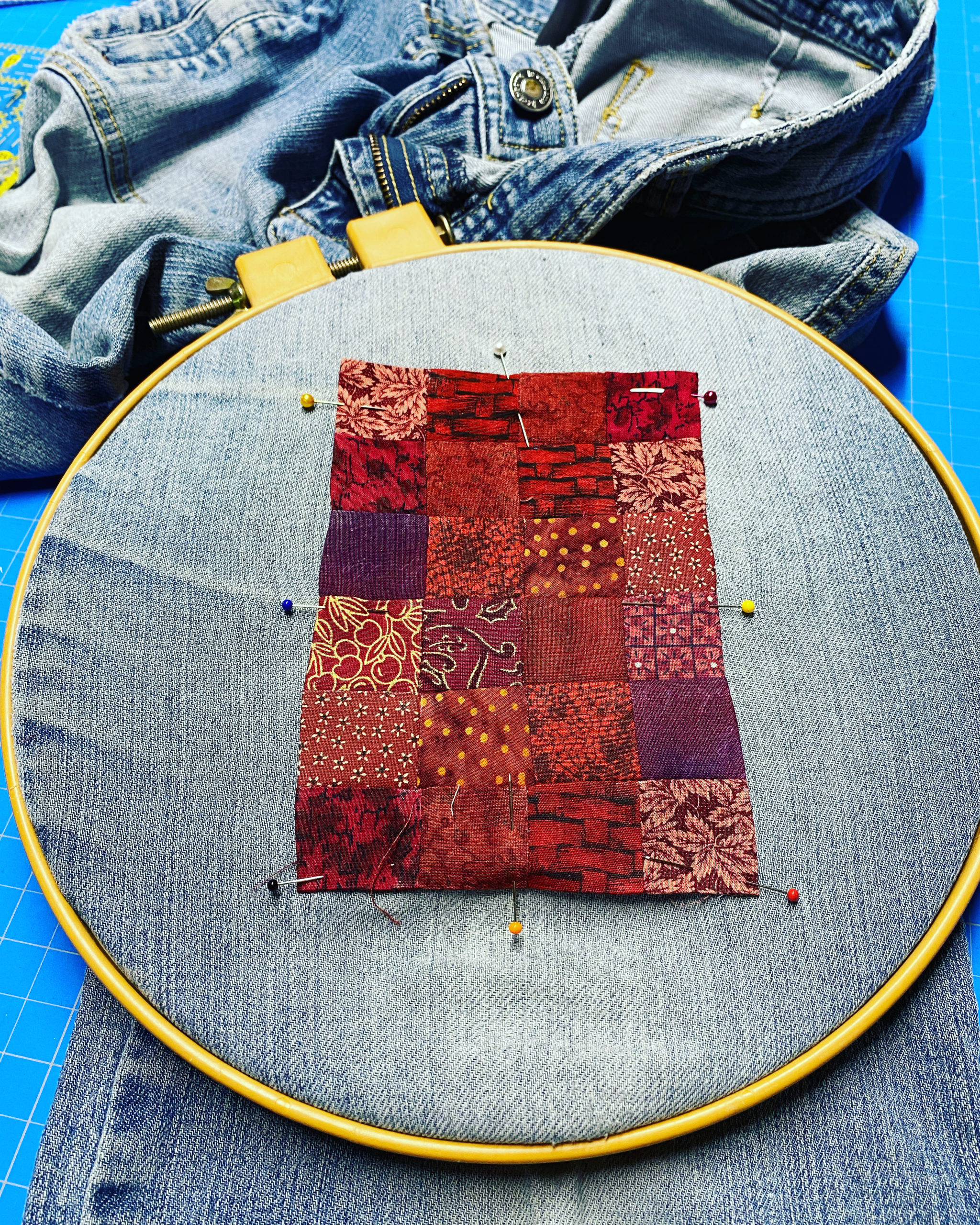Angela of Artfully Sew used fabric scraps to make a patch for a pair of jeans.