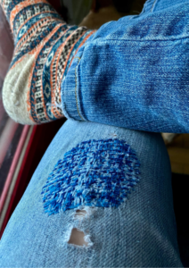 Angela of Artfully Sew used fabric scraps to make a patch for a pair of jeans.